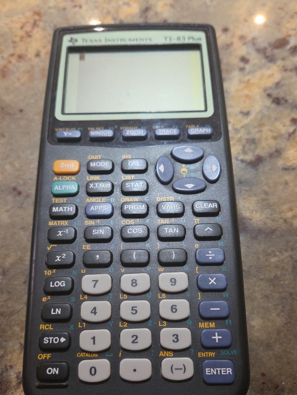 Texas Instruments Graphing Calculator in Black and Gray
